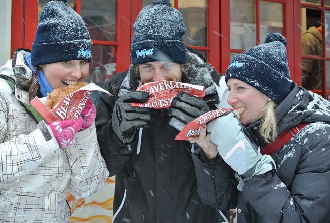 Enjoying beavertails. CREDIT: Laura Meggs - Downtown Kingston!