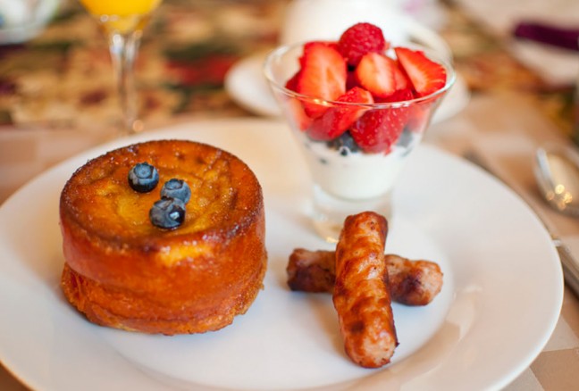 Breakfast at the Secret Garden Inn - a peach pancake, lightly herbed sausage and fresh strawberries and yogurt.