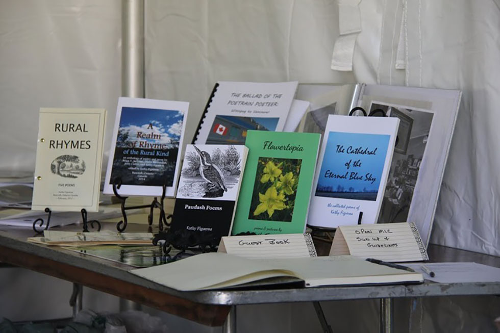 Buy some poetry books at the Poets @ Artfest Tent!