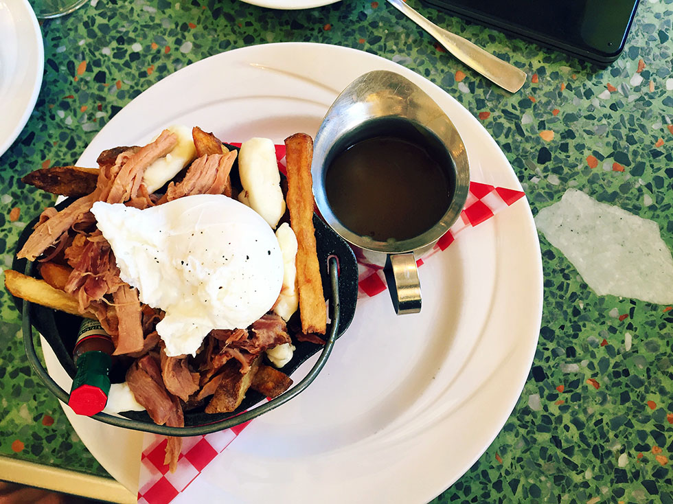 Pan Chancho-breakfast poutine – smoked ham, cheese curds, poached egg drowned in “red-eye" gravy.