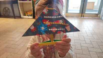 GLM Child holding sailboat no face