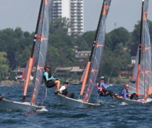A group of people sailing on the waters of Kingston.