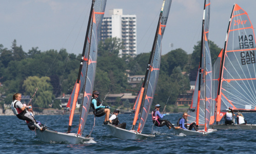 A group of people sail on Kingston's waters.