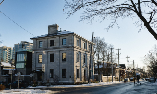 The street view of the Frontenac Club during winter