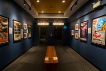 Interior of The Screening Room, walls with many movie posters.