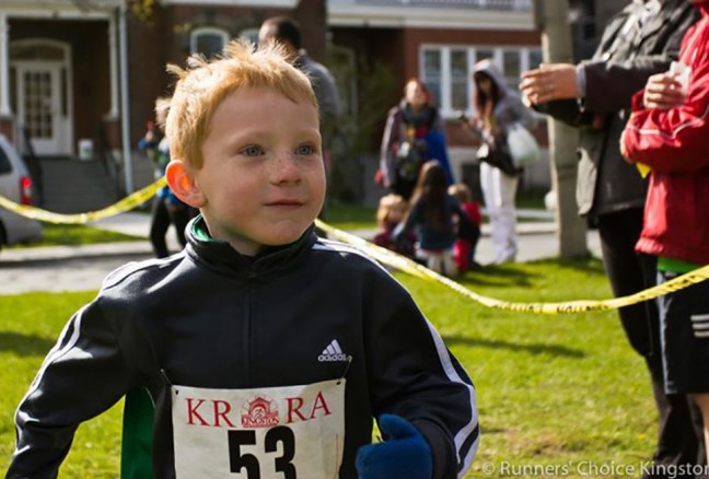 After a solid 3K performance, this little fellow is heading straight for the welcoming arms of his proud Dad. Photo credit: Carter Brundage