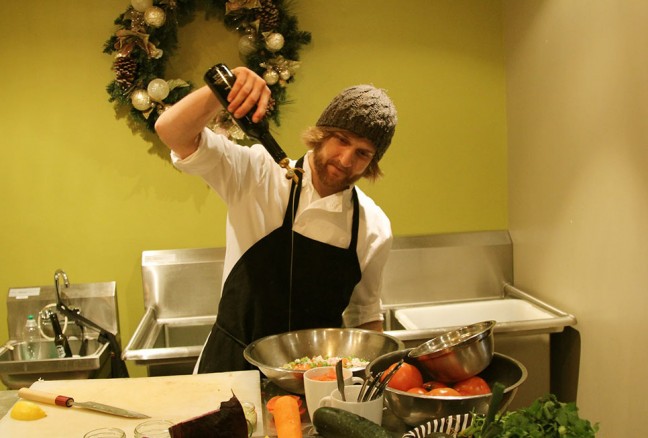 Chef-Eric-Brennan-prepares-brushetta-using-Kingston-Olive-Oil-Company's-Persian-Lime-oil