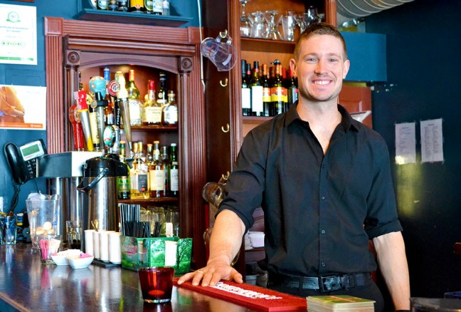 Man behind the bar - Tim Archibald.