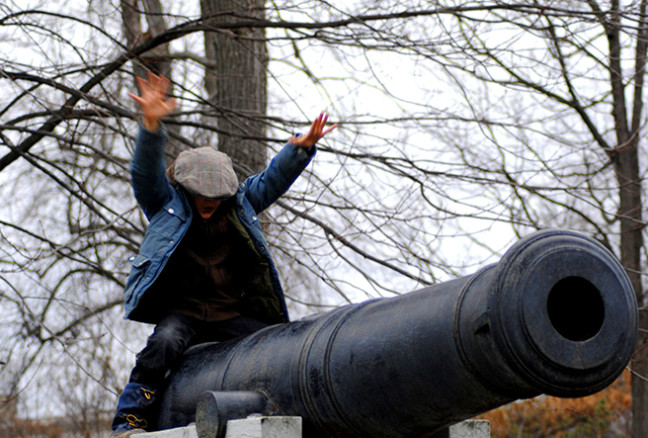 Kids cannot resist climbing the cannons that flank the statue of Sir John A.