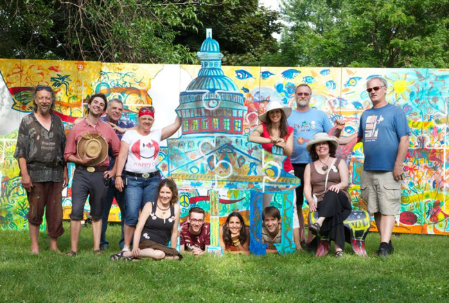 A few of last year’s artists, including Lory MacDonald (seated), the show producer. (Photo: Artfest Kingston)