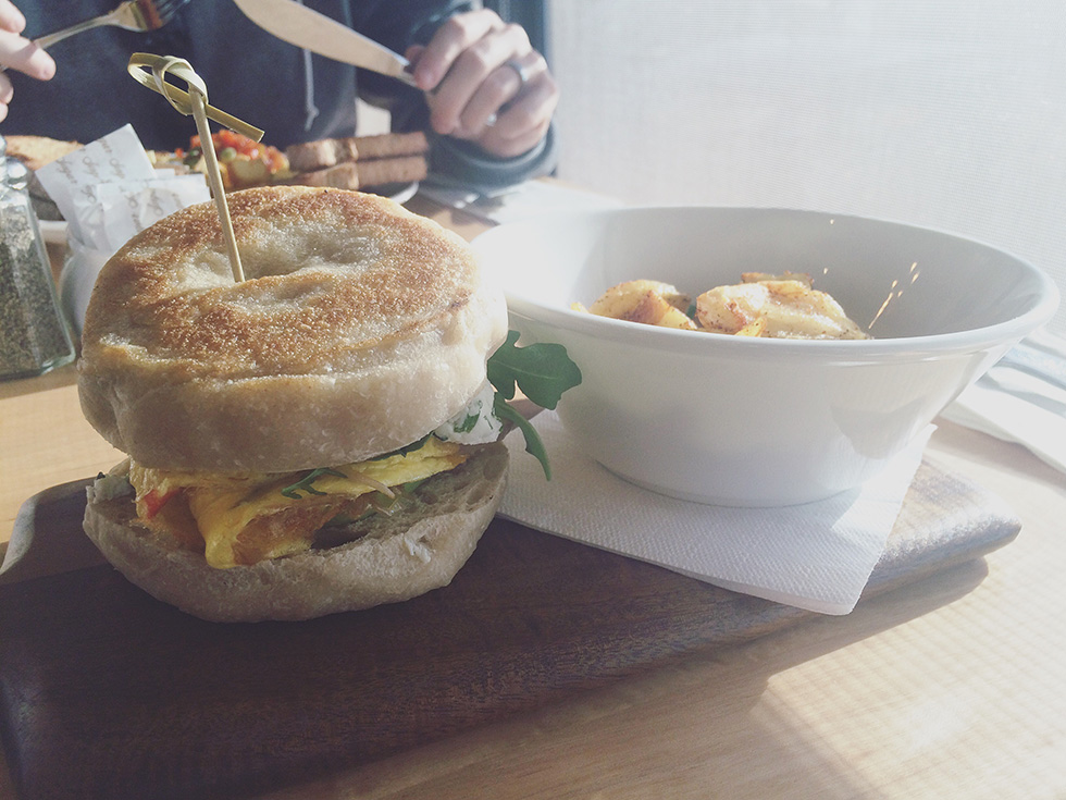 TJ Sandwich: avocado, peppers, arugula, egg, goats cheese, and house-made griddlecake.
