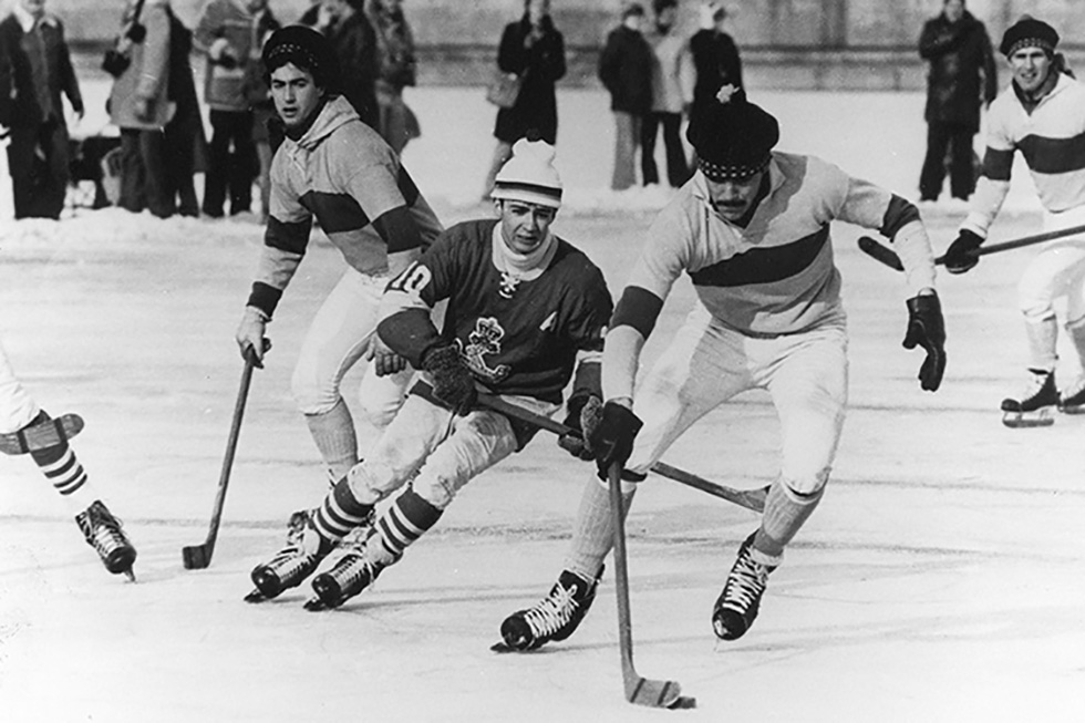 During the 1886 game, sticks were only a metre long and the “puck” was a whittled-down lacrosse ball. (Flickr/Queen’s University)