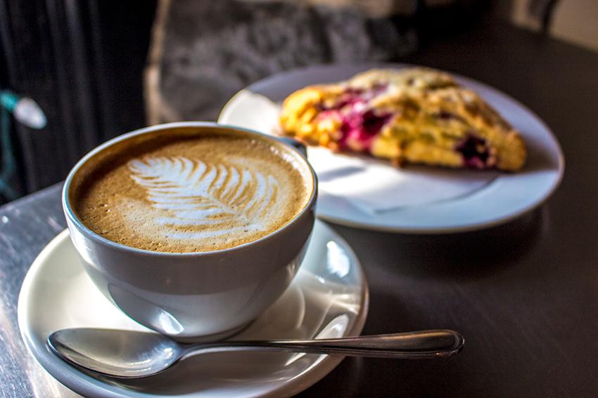 The Common Market latte and raspberry scone