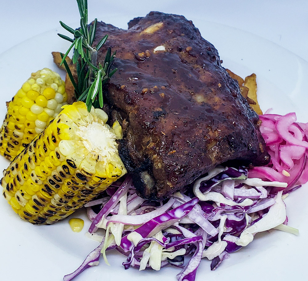 BBQ pork ribs, local corn and coleslaw.