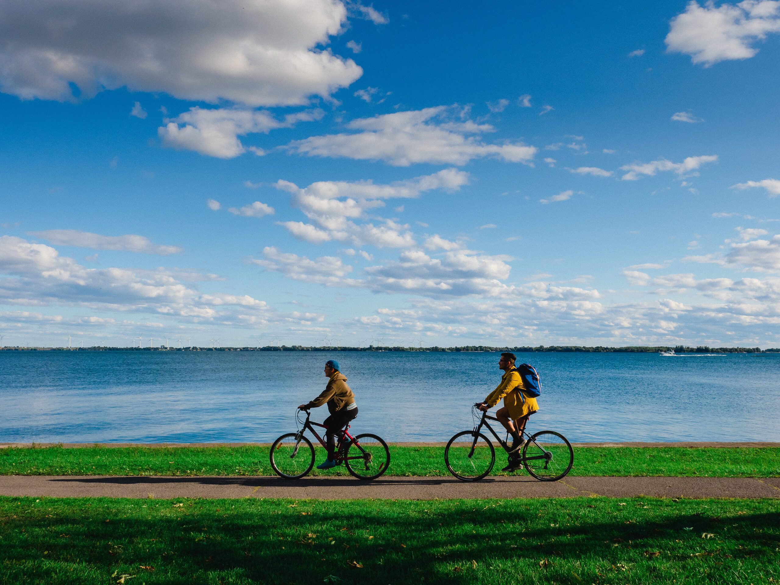 People biking along the Kingston waterfront
